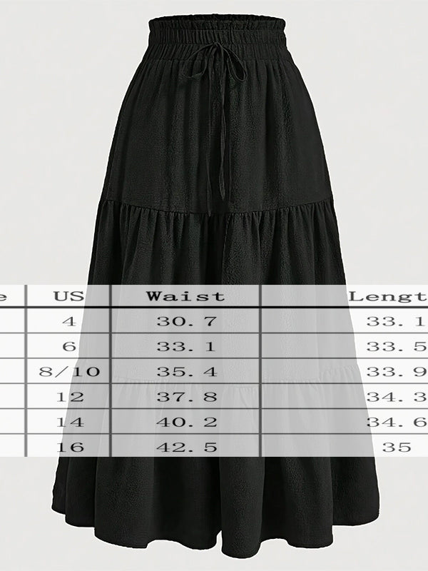 Black skirt with size chart on a white background